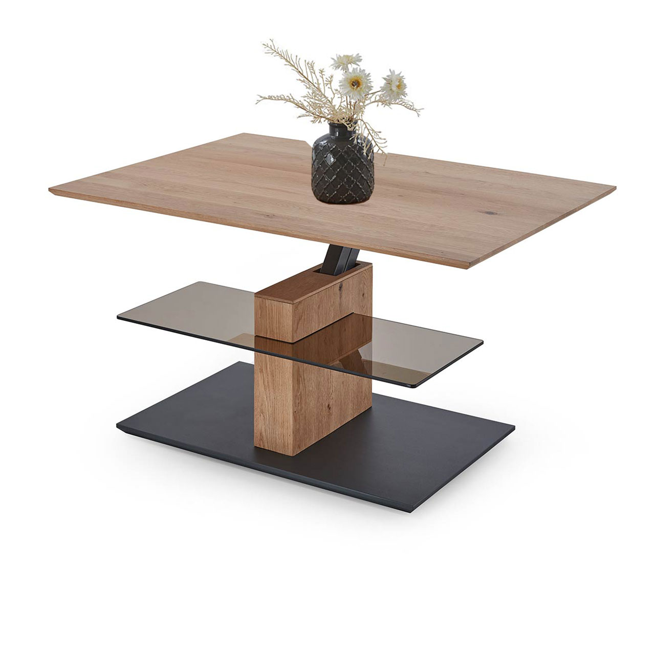 Edler Couchtisch mit rechteckiger, hochgefahrener Tischplatte aus hellem Eichenholz  und zusätzlicher fester Glasablage darunter - auf massiver Holzsäule und dunkler Bodenplatte.