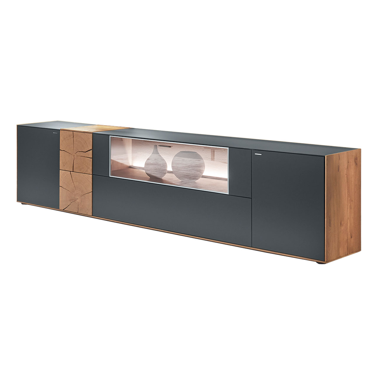 Hartmann CAYA - Lowboard 7170-3231 Modernes Lowboard aus massiver Kerneiche Umato mit Mattglas anthrazit Front, mittig mit Glasklappe, links mit dekorativer Hirnholz Applikation aus zwei rechteckigen Hirnholzscheiben.