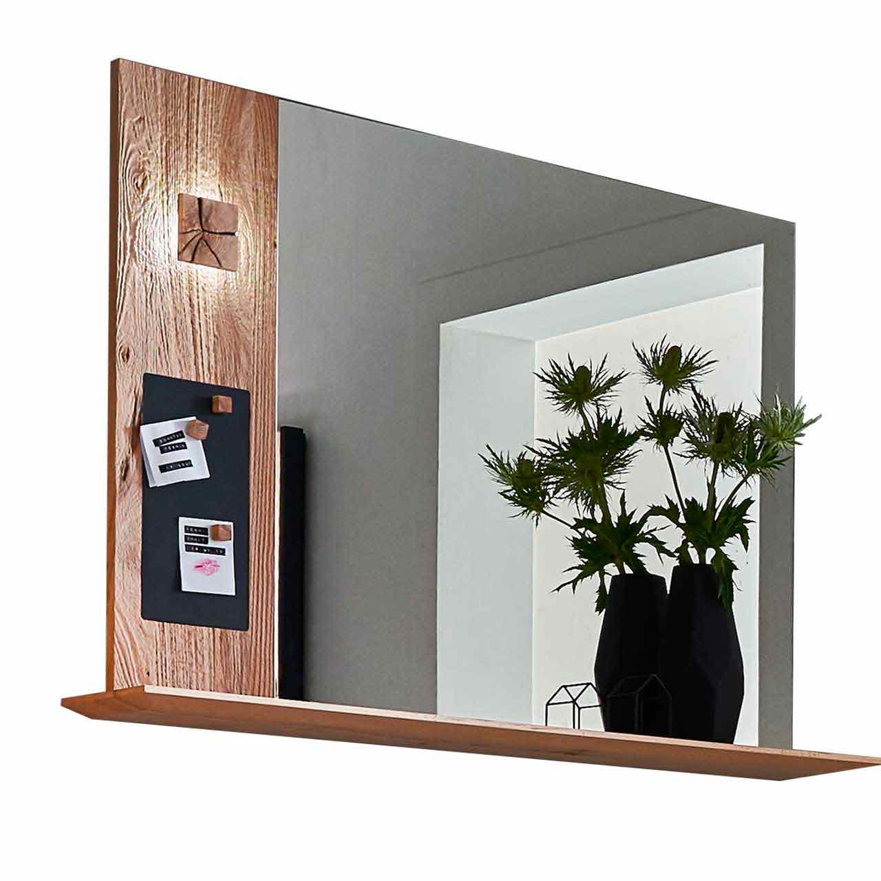 Hartmann CAYA Garderoben - Spiegelpaneel mit Notiztafel und Ablage 7140-5111 Modernes Wandpaneel aus massiver Kerneiche Umato mit großem Spiegel mit darunter verlaufendem Ablageboden aus Holz. Links Holzapplikation mit dekorativen, beleuchteten Hirnholzscheiben und einer kleinen Metalltafel.