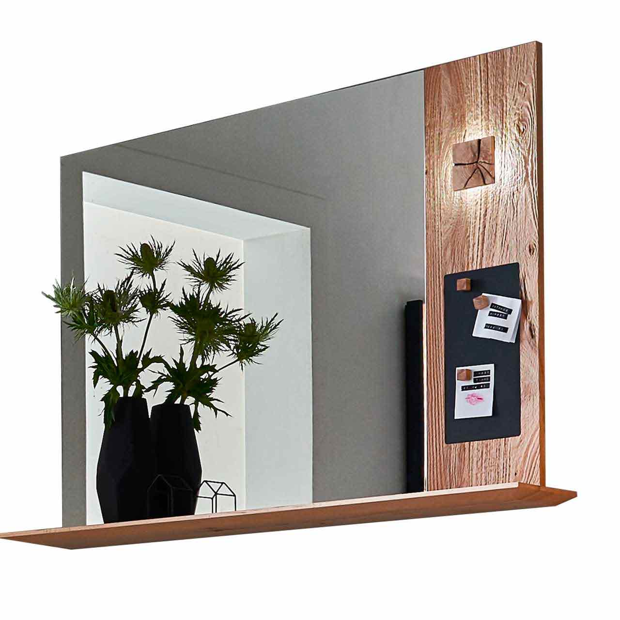 Hartmann CAYA Garderoben - Spiegelpaneel mit Notiztafel und Ablage 7140-5112 Modernes Wandpaneel aus massiver Kerneiche Umato mit großem Spiegel mit darunter verlaufendem Ablageboden aus Holz. Rechts Holzapplikation mit dekorativen, beleuchteten Hirnholzscheiben und einer kleinen Metalltafel.