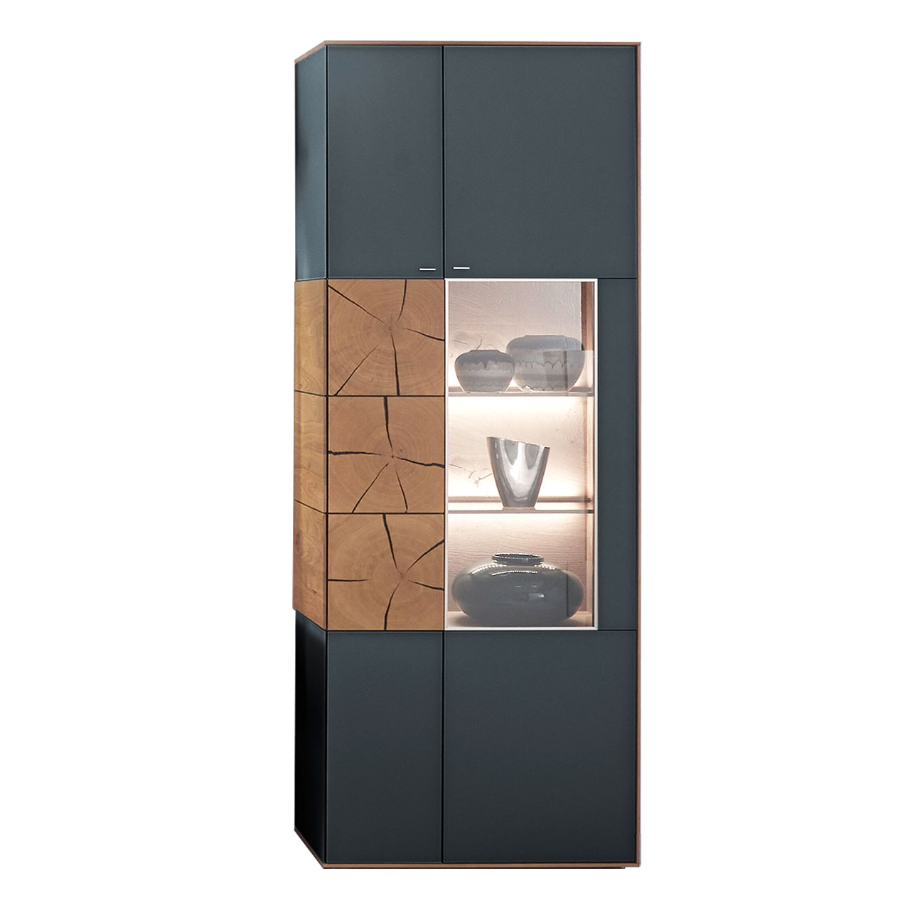 Hartmann CAYA - Standvitrine 7170-0088A re. Moderne Standvitrine aus massiver Kerneiche mit Mattglas anthrazit Front. Rechts mit Glastür, links mit Holztür mit Mattglas anthrazit Front und drei dekorativen Hirnholzscheiben.