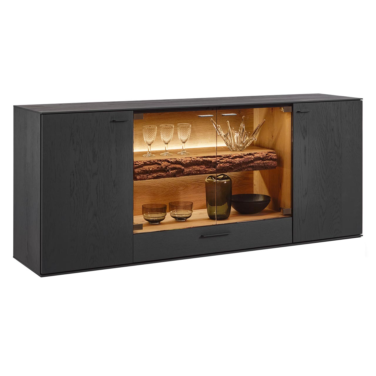 Hartmann RUNA - Sideboard 8410-4193 - Kerneiche Natur Anthrazit gebeizt Modernes Sideboard aus massiver Kerneiche Natur in Anthrazit gebeizt mittig mit beleuchtetem Glasausschnitt und sichtbarem Rindenboden.