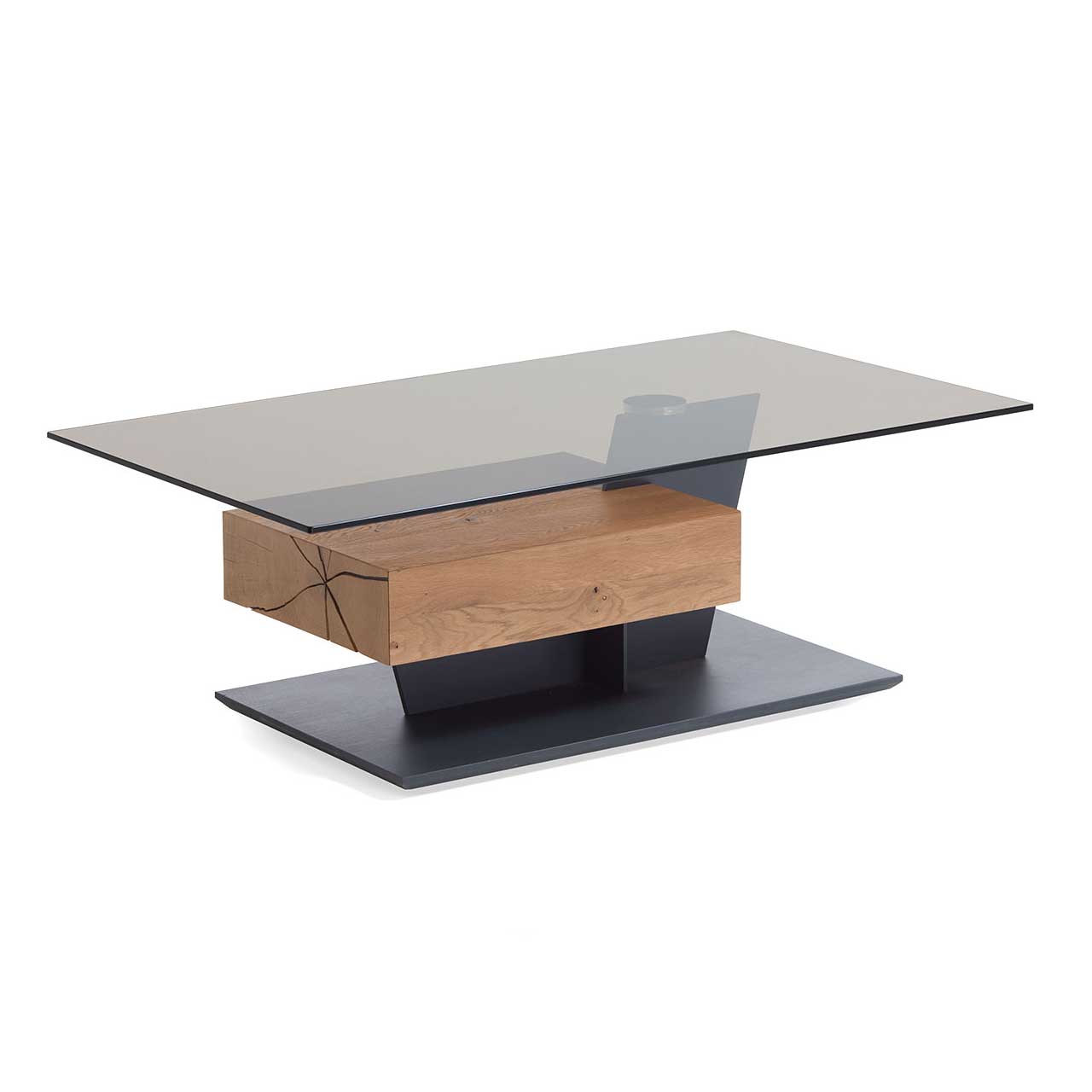 Hartmann NATURWERKE - Couchtisch 7100C-1402 Moderner Couchtisch mit rechteckiger Glasplatte und Hirnholzblock aus massiver Kerneiche mit Schubkasten auf dunkler Bodenplatte.