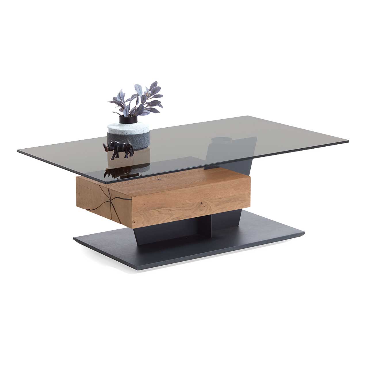 Hartmann CAYA - Couchtisch 7170-1402 Moderner Couchtisch mit rechteckiger Tischplatte in Parsolbronze an seitlicher Metallstütze mit massivem Hirnholzbalken in Kerneiche Umato mit Schubkasten. Bodenplatte rechteckig in Holz anthrazit.